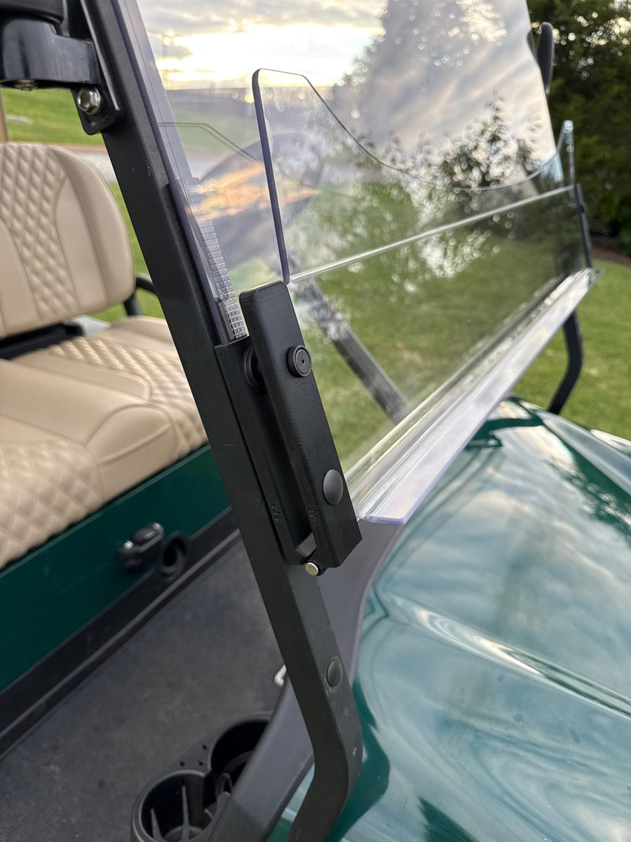 Evolution pivot hinge with the lower AS-4 polycarbonate panel flipped out for airflow on a Club Car Onward LSV