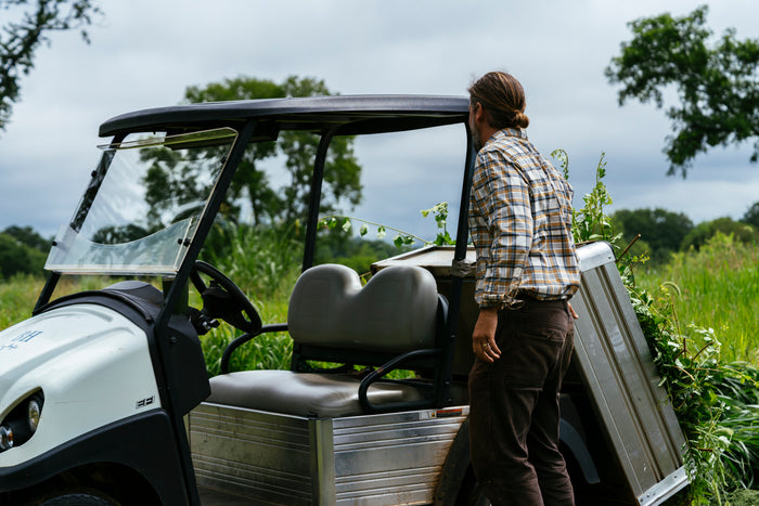 carryall vehicle using uv blocking evolution windshield in the field 