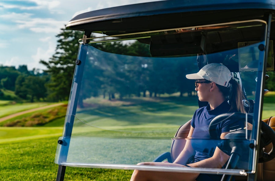 Clear MagMount golf cart windshield installed on Club Car Precedent