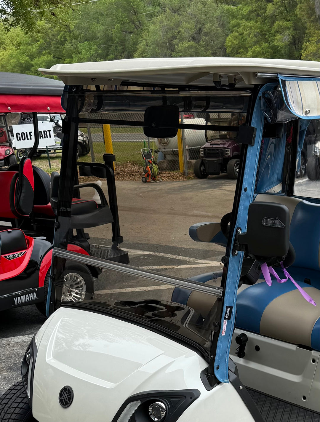 Tinted MagMount golf cart windshield installed on Yamaha Drive 2