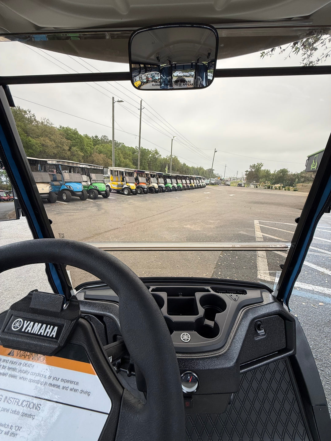 Tinted MagMount golf cart windshield installed on Yamaha Drive 2